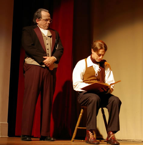 Scrooge watching Crachit